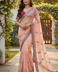 Zephyr Peach Organza Silk Saree With Incomparable Full Stitched Blouse