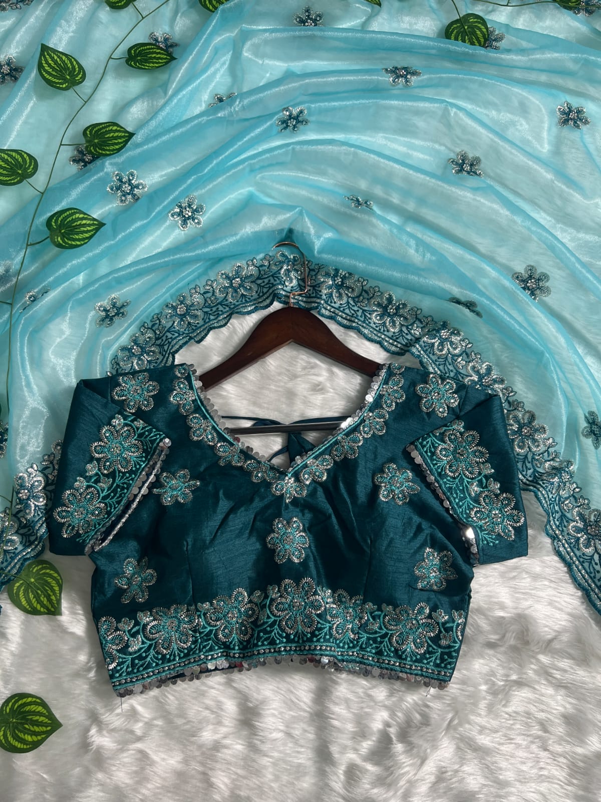 Confounding Sky Organza Silk Saree With Lissome Full Stitched Blouse