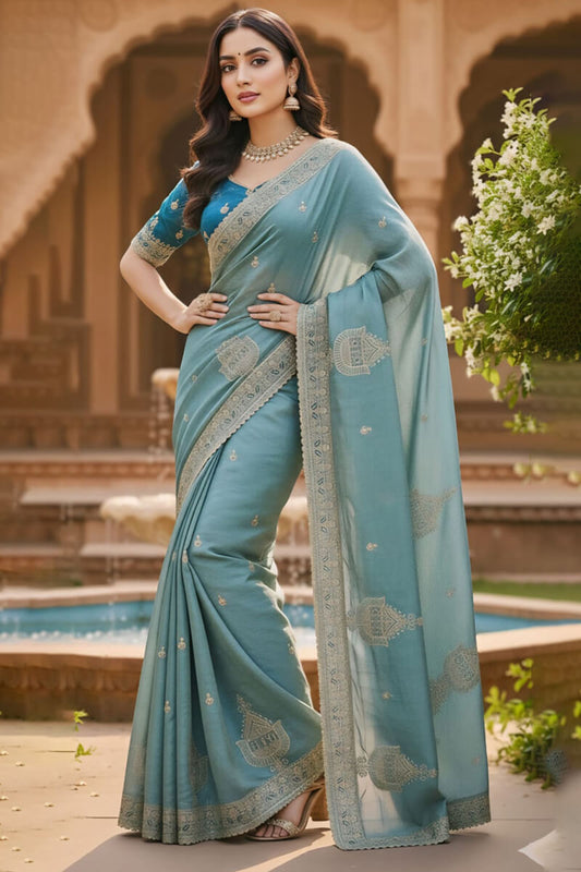 Enigmatic Sky Embroidery Work Chiffon Silk Saree With Elaborate Full Stitched Blouse