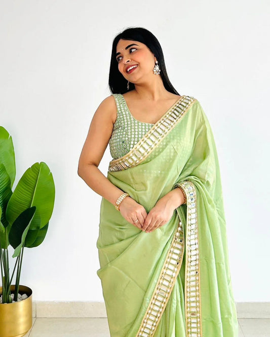 Dazzling Pista Satin Silk Mirror Work Saree With Splendorous Blouse Piece