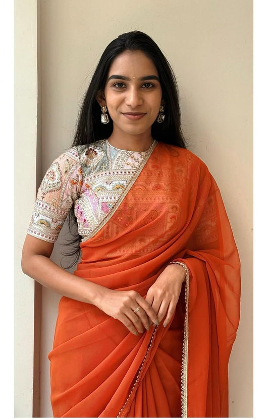 Sizzling Orange Georgette Silk Saree With Embroidery Work Blouse Piece