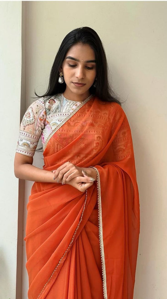 Sizzling Orange Georgette Silk Saree With Embroidery Work Blouse Piece