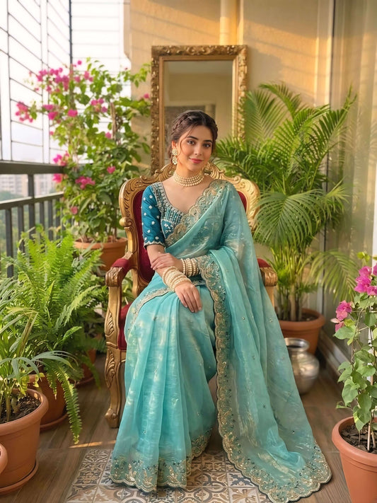 Extraordinary Turquoise Fendy Silk Sequence Embroidery Work Saree With Stitched Blouse