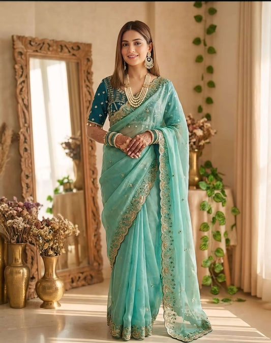 Extraordinary Turquoise Fendy Silk Sequence Embroidery Work Saree With Stitched Blouse