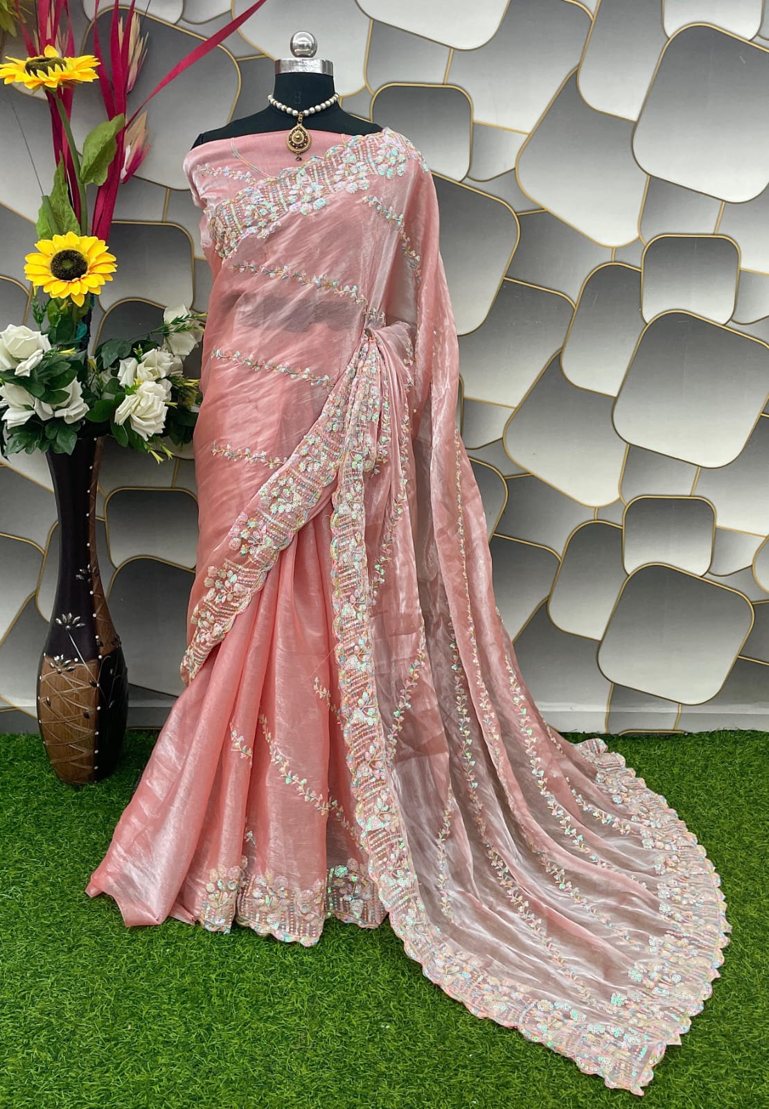 Beleaguer Peach Jimmy Choo Silk Saree With Exquisite Blouse Piece