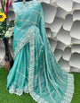 Amazing Turquoise Jimmy Choo Silk Saree With Innovative Blouse Piece