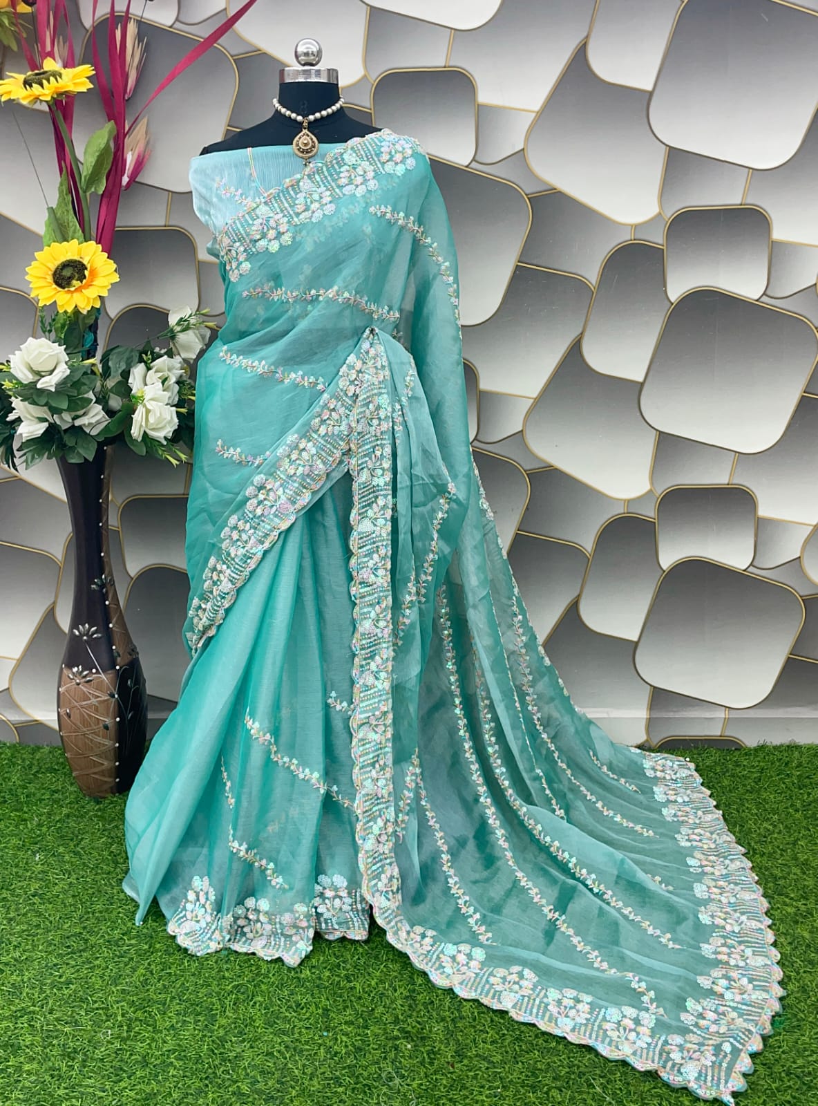 Amazing Turquoise Jimmy Choo Silk Saree With Innovative Blouse Piece