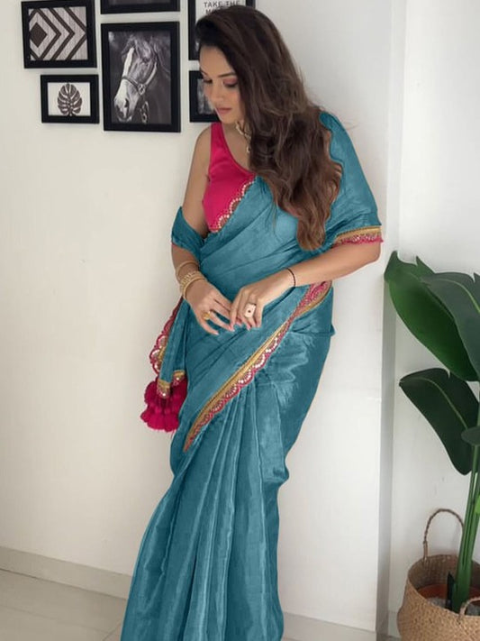 Captivating Firozi Tissue Silk Saree With Enticing Blouse Piece