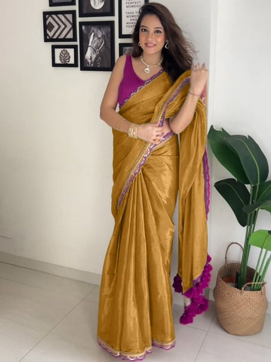 Exquisite Mustard Tissue Silk Saree With Dulcet Blouse Piece